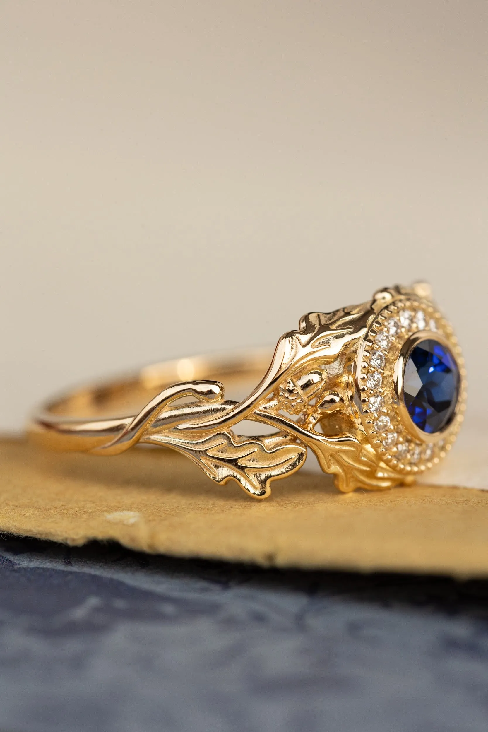 Halo diamond and lab blue sapphire engagement ring, celtic ring with oak leaves and diamonds / Dair