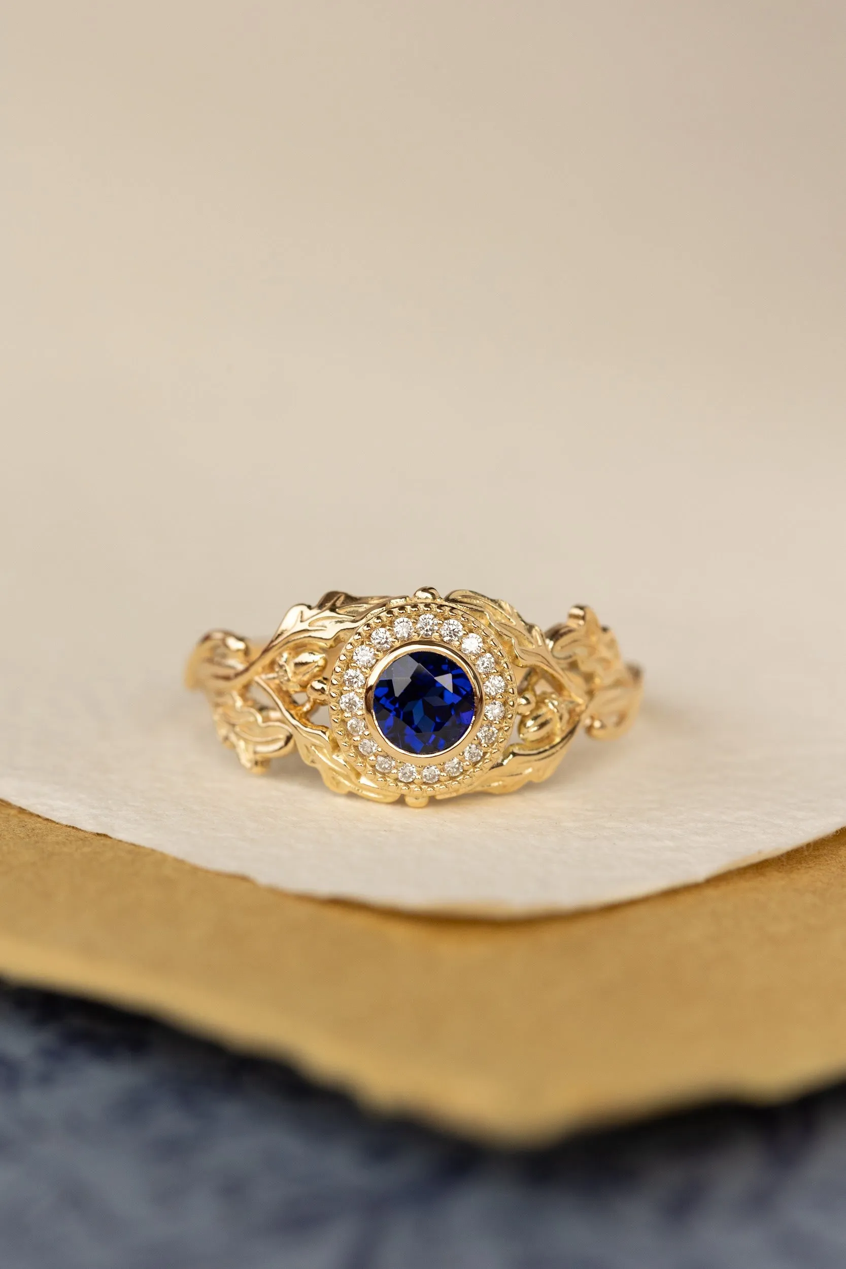 Halo diamond and lab blue sapphire engagement ring, celtic ring with oak leaves and diamonds / Dair